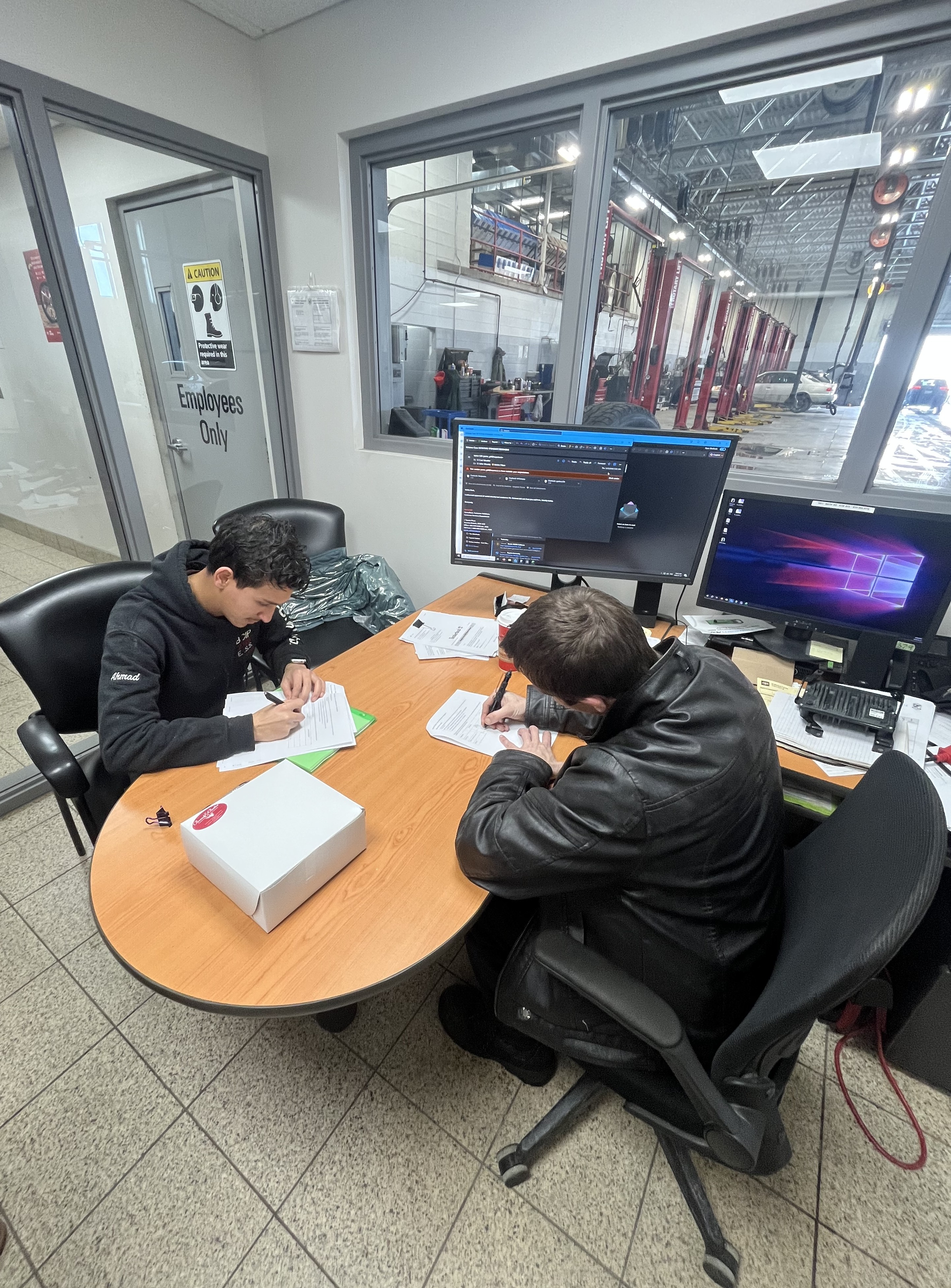 Ahamd and Curt Inking a Deal